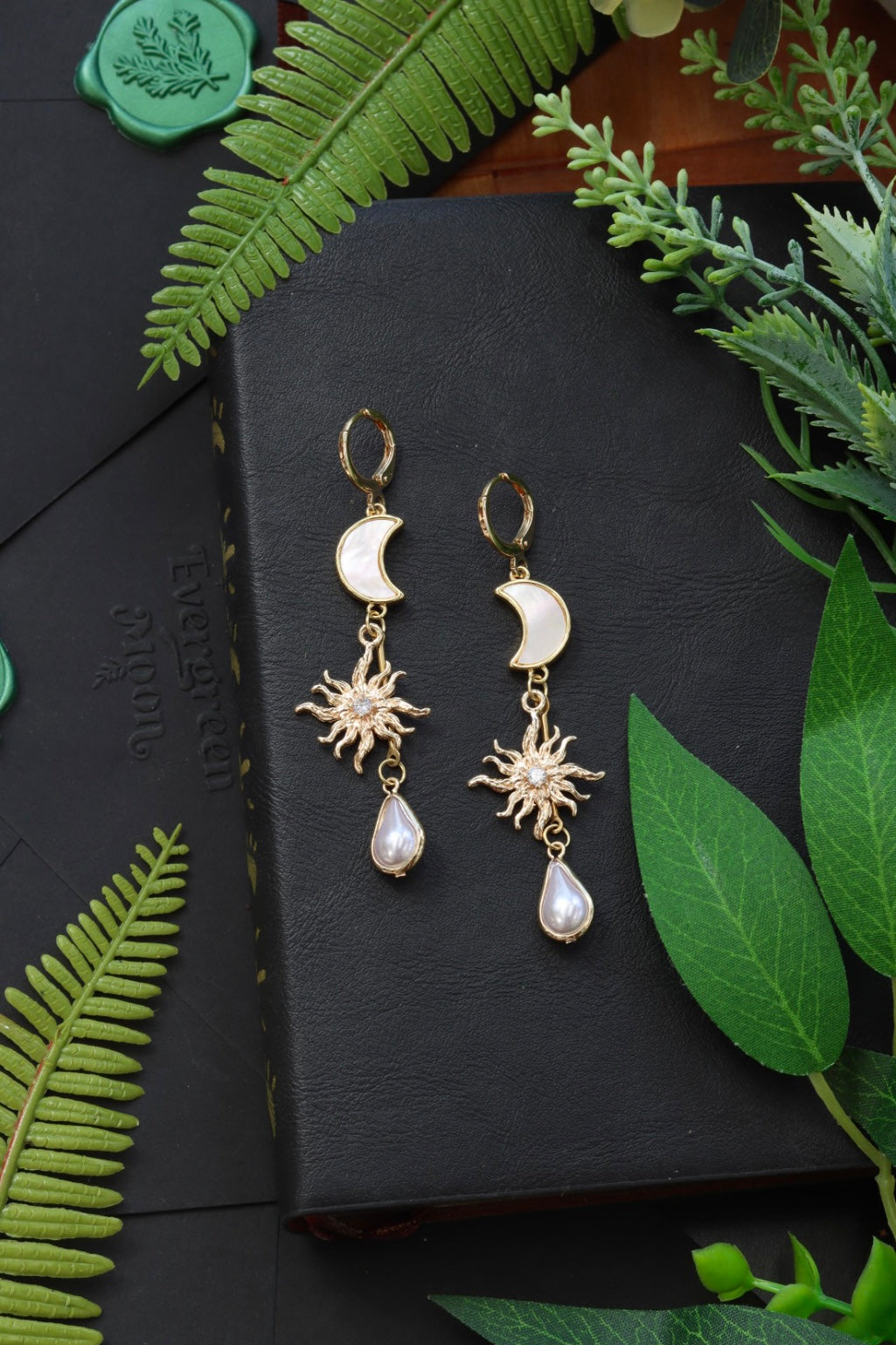 Pearl sun and moon earrings