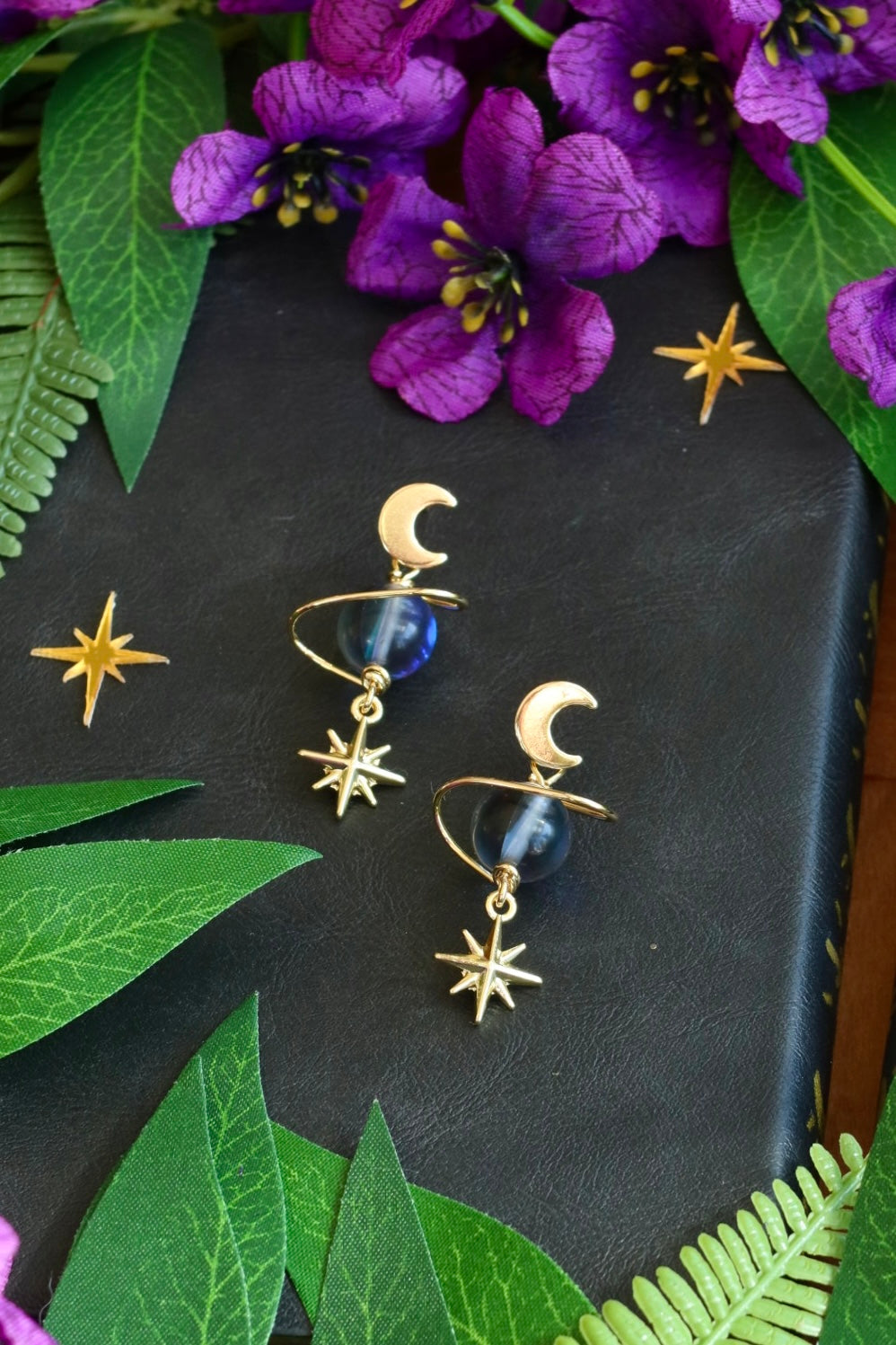 Blue saturn star earrings