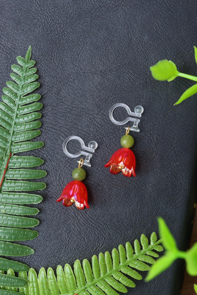 Red flower clip on earrings