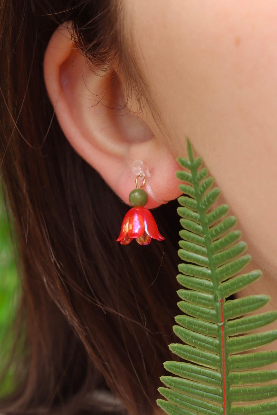 Red flower clip on earrings